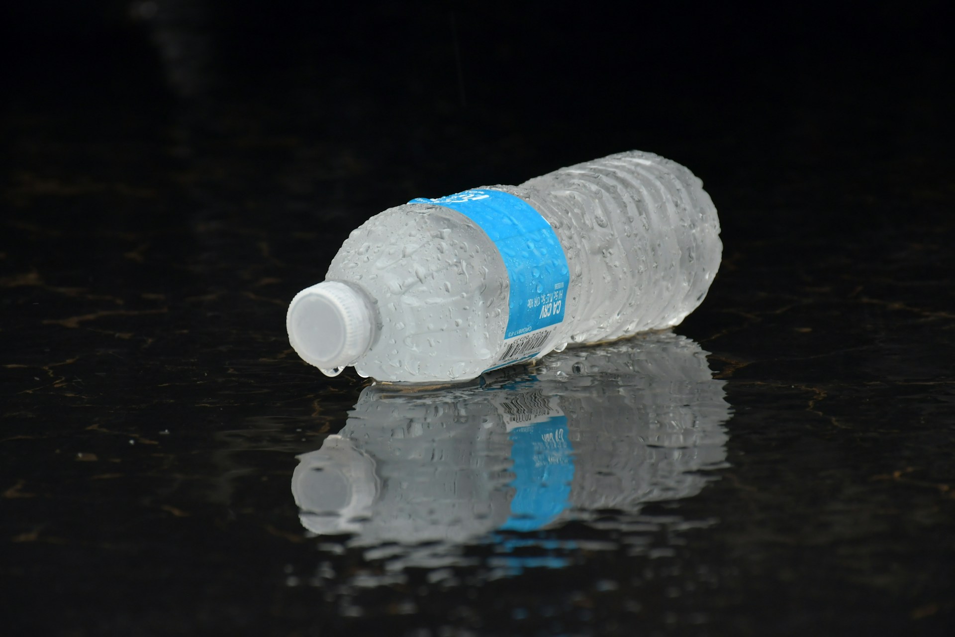 A Guide to Water Bottle Labels: Material, Application, and Print Quality